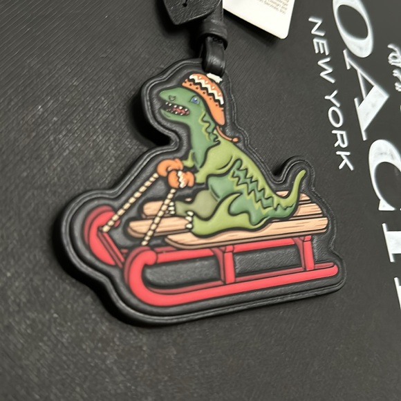 NWT Coach Rexy Sled Bag Charm Signature Canvas Leather Dinosaur Keychain - Picture 4 of 6